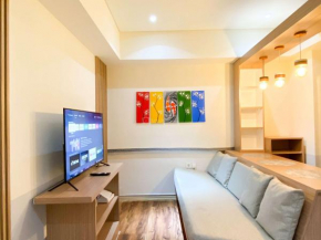 Cozy Living and Relaxing 2BR Meikarta Apartment By Travelio